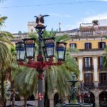 Placa Reial, detail of colorful lamp post known as Gaudì first